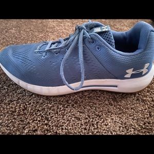 Women’s underarmour tennis shoes.